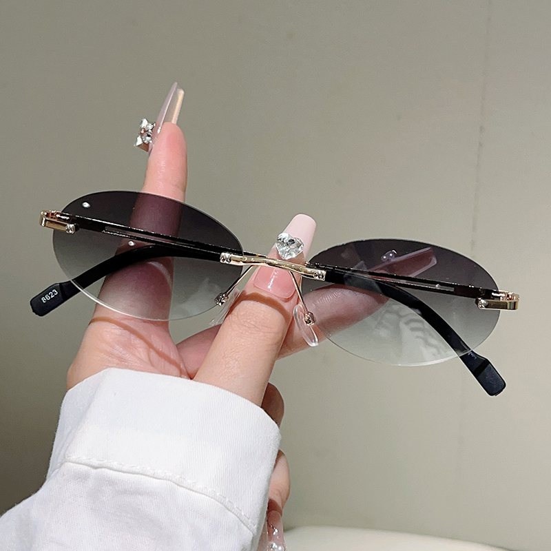 Rimless ovale zonnebrillen voo - Designer Sunglasses recensie en prijs
